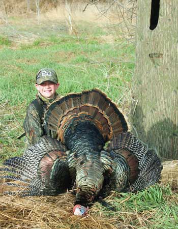 Young boy has a successful turkey hunt